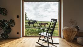 Life in symbiosis with nature is the promise of a recently built detached house in a small village near Pilsen (Czech Republic). Built on a meadow close to the forest, it captures the special atmosphere and quality of the place, adapting itself in form and material. 